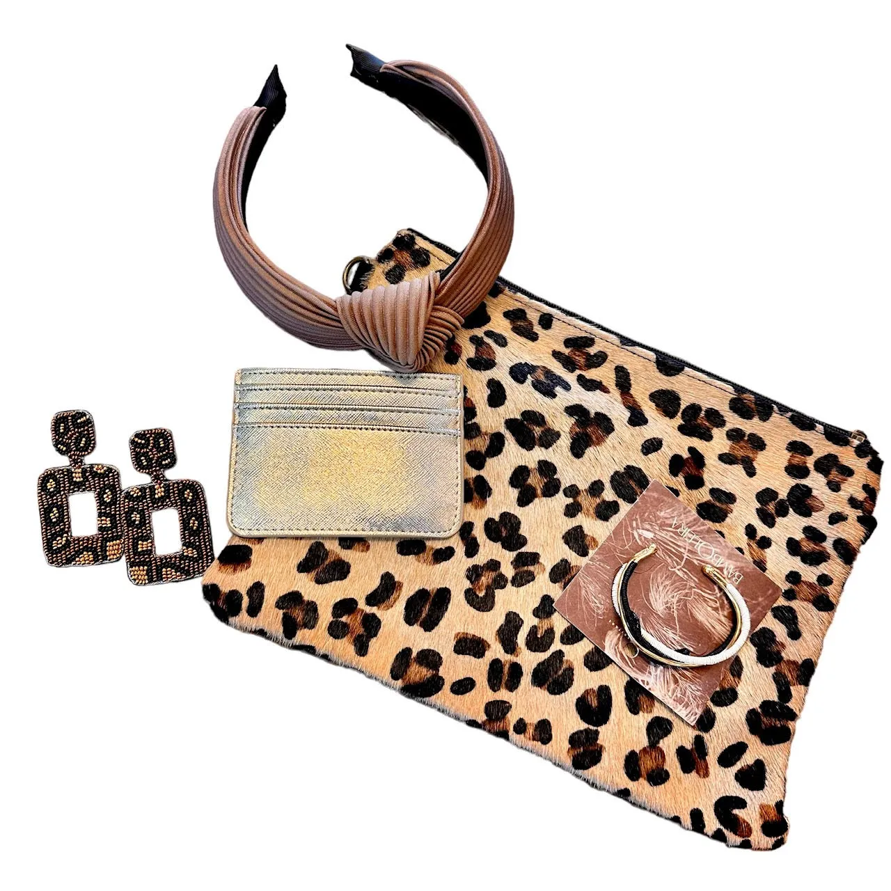 Animal Print Cowhide Clutch in leopard/light brown